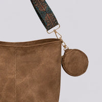 Sac Aliénor marron, détail de la sangle tissée et du porte-monnaie rond