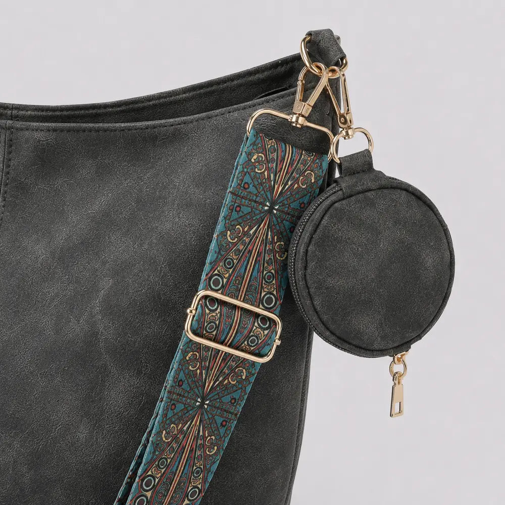 Sac Aliénor noir, détail de la sangle tissée et du porte-monnaie rond