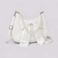 Sac à main perlé Célestine blanc, vue trois quarts