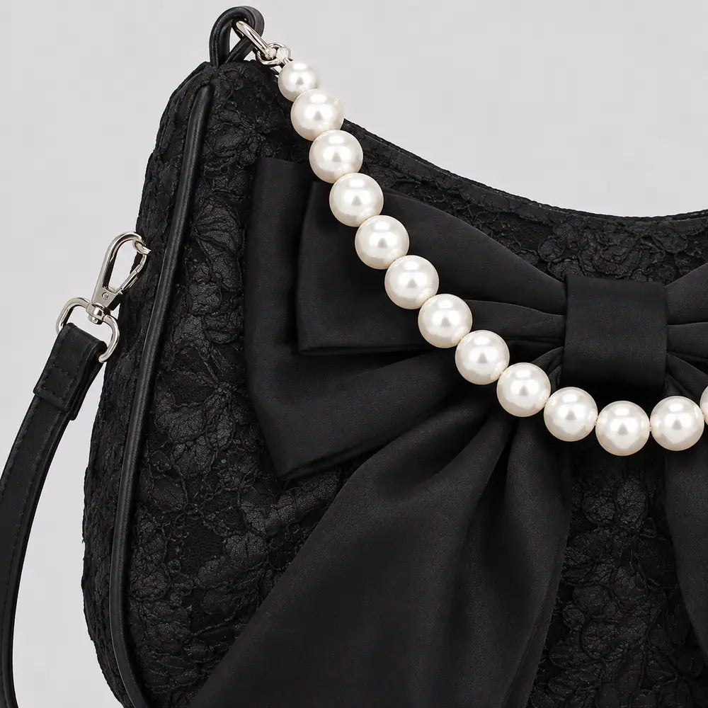 Sac Célestine noir, détail du nœud et de la poignée perlée
