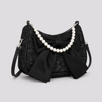 Sac à main perlé Célestine noir, vue trois quarts