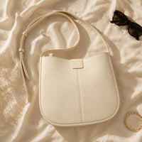 Sac bandoulière Crème — Aveline, flatlay premium — ENNA PARIS