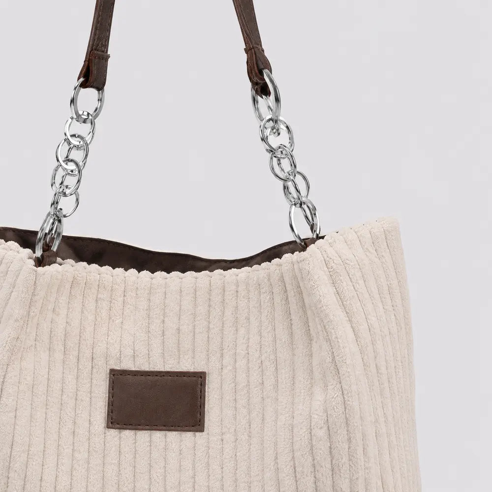 Sac à main Daphné Beige, détail de la chaîne argentée et des anses