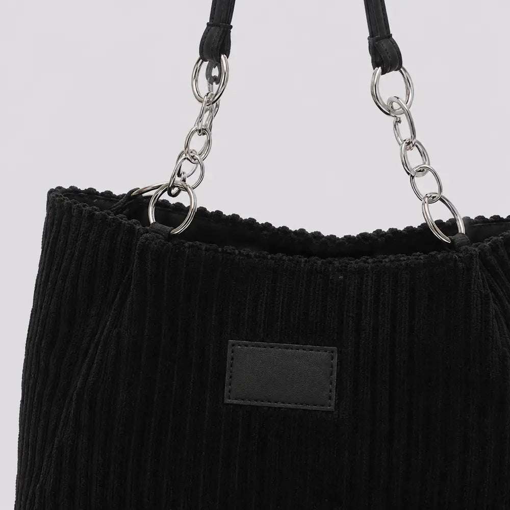 Sac à main Daphné Noir, détail de la chaîne argentée et des anses