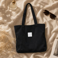 Sac cabas Mélina Noir, packshot premium flatlay