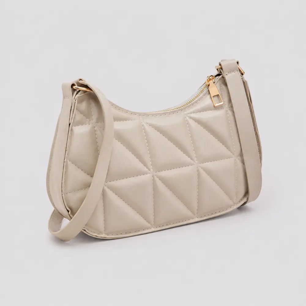 Petit sac à main beige Victoire, vue trois-quarts sur fond studio neutre