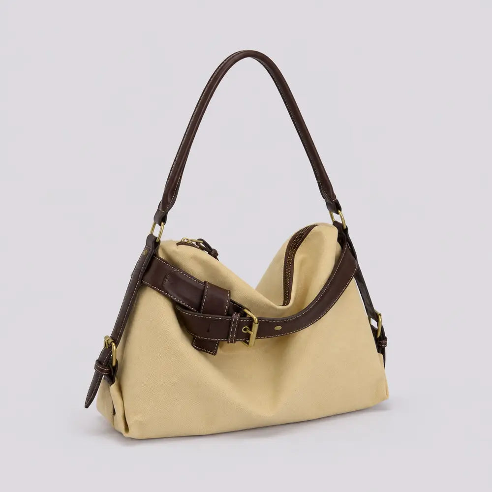 Sac à main beige Bertille, vue trois-quarts sur fond studio neutre