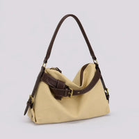 Sac à main beige Bertille, vue trois-quarts sur fond studio neutre