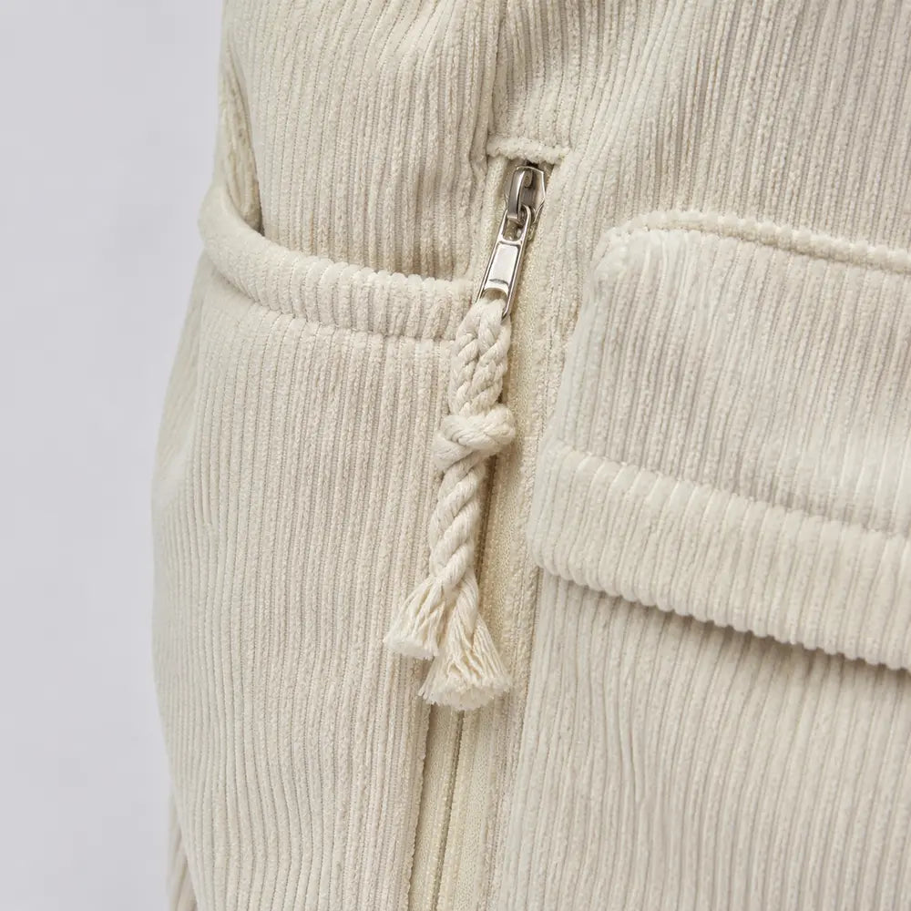 Sac à main Ivoire — Cléophée, gros plan sur le zip de poche et le pompon corde