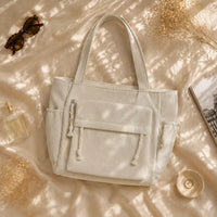Sac à main Ivoire — Cléophée, flatlay premium ENNA