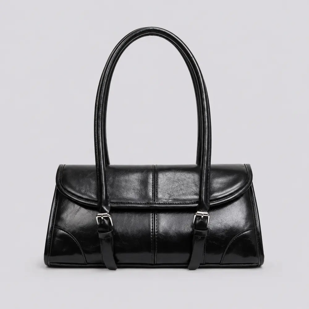 Sac à main noir Nine, face sur fond studio neutre