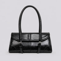 Sac à main noir Nine, face sur fond studio neutre