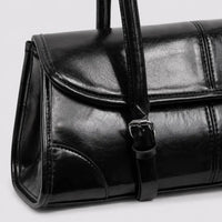 Sac à main noir Nine, zoom sur la matière et les coutures