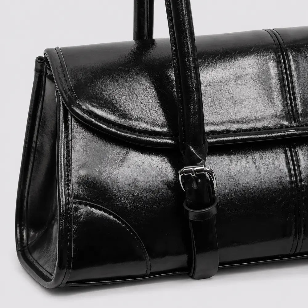 Sac à main noir Nine, zoom sur la matière et les coutures