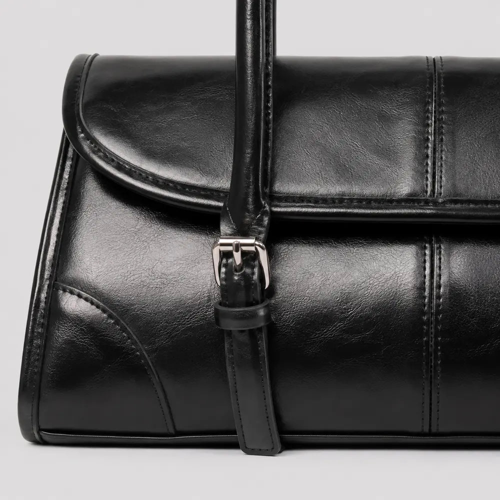 Sac à main noir Nine, zoom sur le détail distinctif et la fermeture